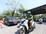 BPJS Bagikan Alat Safety Riding kepada Pekerja Iqbal Beri Apresiasi